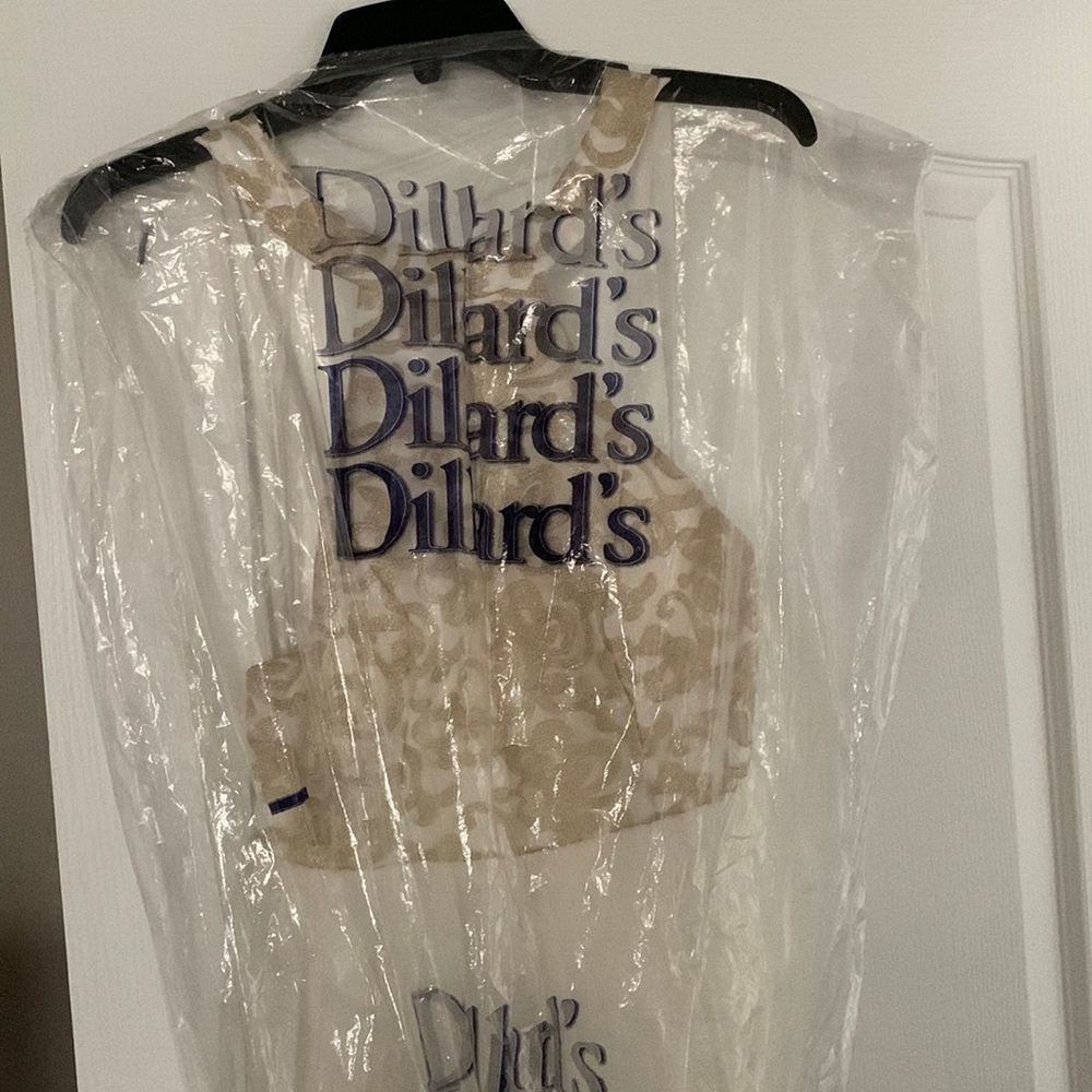 Selling sequins heart dress from Dillards.